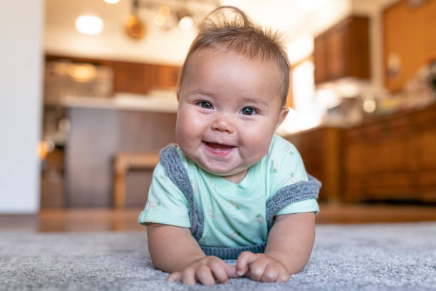 Baby on carpet flooring | Broadway Carpets, Inc