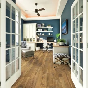 Laminate in a medium brown wood tone in a home office | Broadway Carpet & Flooring