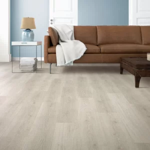 Mohawk Laminate in a light, almost white wood tone in a living room