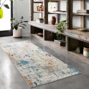 Loloi area rug in a distressed white, blue, and brown abstract pattern | Broadway Carpet & Flooring