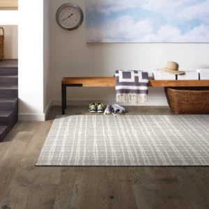 A light-colored Shaw Floors area rug | Broadway Carpet & Flooring
