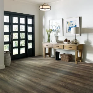 Magnificent-FH821-07057-DakotaHickory-7.5in-8U555-RM Dark brown hardwood in an entryway with a black front door | Broadway Carpet & Flooring