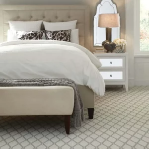 White and gray patterned carpet in a bedroom | Broadway Carpet & Flooring