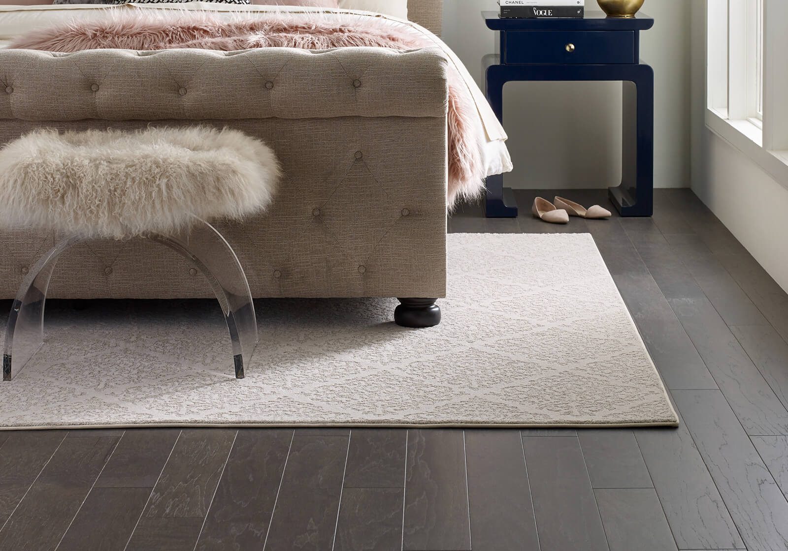 custom area rug in bedroom | Broadway Carpets, Inc